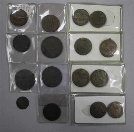 A collection of copper bank tokens,
